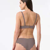 Back of woman wearing brown balconette bikini in cocoa