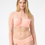 Woman wearing peach bikini