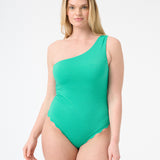 Woman wearing green one piece swimsuit