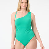 Woman wearing green one piece swimsuit