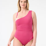 Woman wearing pink one piece swimsuit