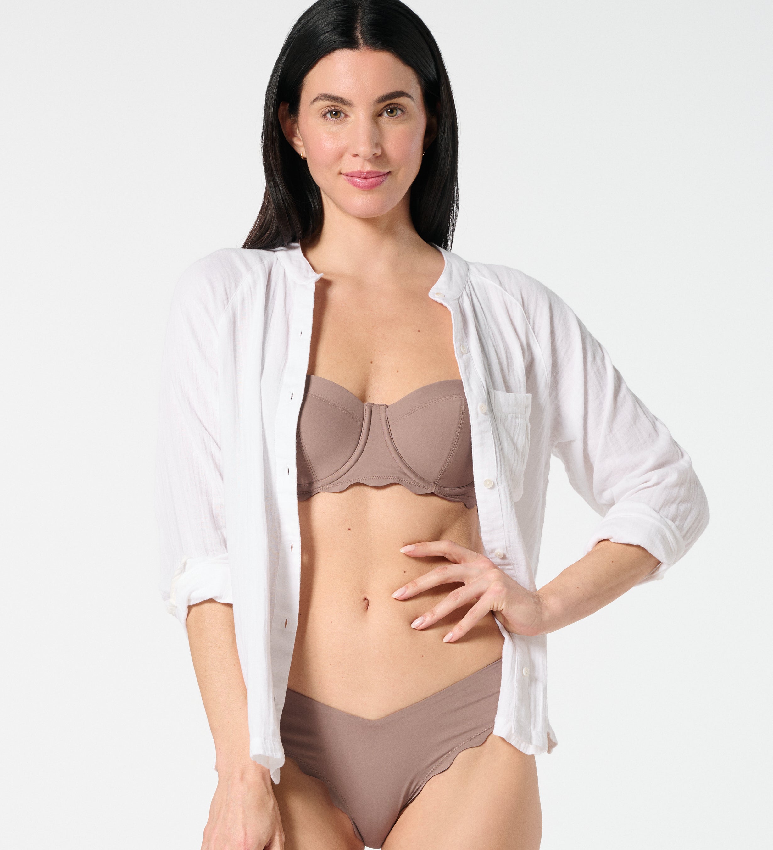 White gauze button-down worn open over Cocoa balconette bikini top and matching bottoms — breathable swim cover-up look