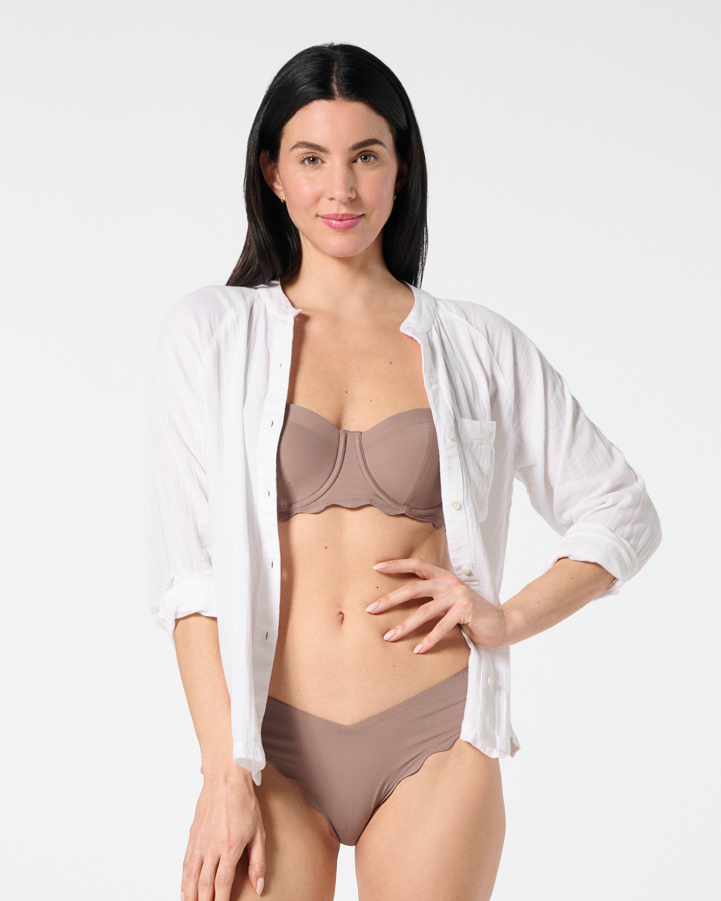 White gauze button-down worn open over Cocoa balconette bikini top and matching bottoms — breathable swim cover-up look