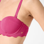 Close-up of textured Hibiscus balconette bikini top with underwire support, scalloped edge, and adjustable straps