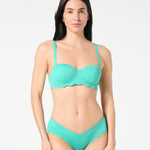 Front view of woman wearing Siren + Sage Goddess Balconette Bikini Top and Iris Bikini Bottoms in Deep Dive textured Italian fabric, showing supportive balconette fit and sculpting coverage